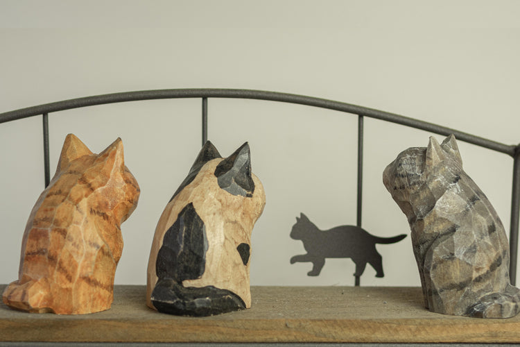 Vintage-style hand-carved wooden cat figurines from the Retro Cats collection, featuring nostalgic and classic designs.