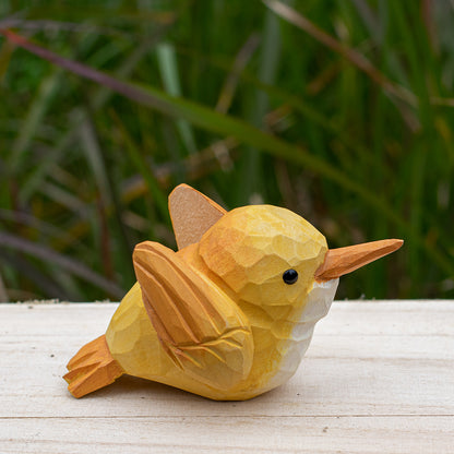 Hand-carved wooden robin figurine with earthy red and brown accents, designed for bird lovers.