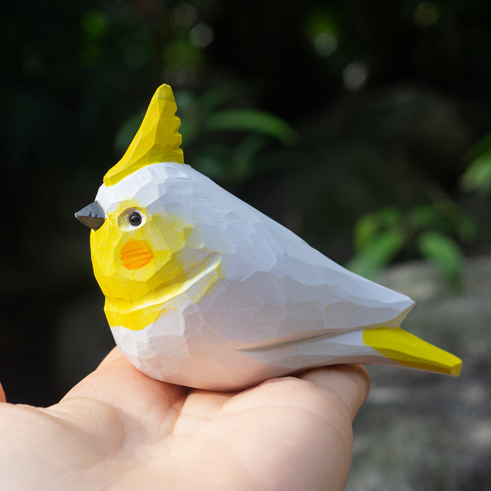 Hand-carved wooden figurine of a Lutino Cockatiel, an ornament great for home decor and gifts. 