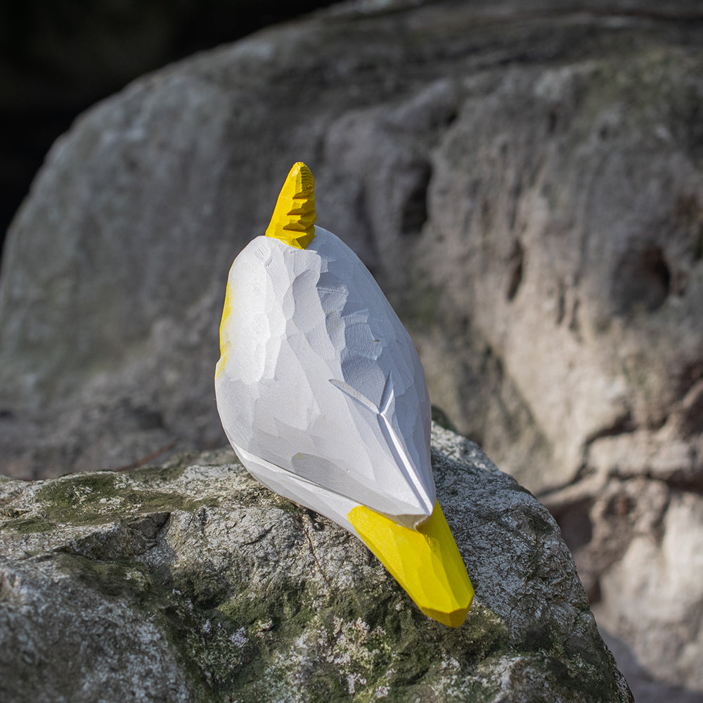 Hand-carved wooden figurine of a Lutino Cockatiel, an ornament great for home decor and gifts. Free shipping over $69.