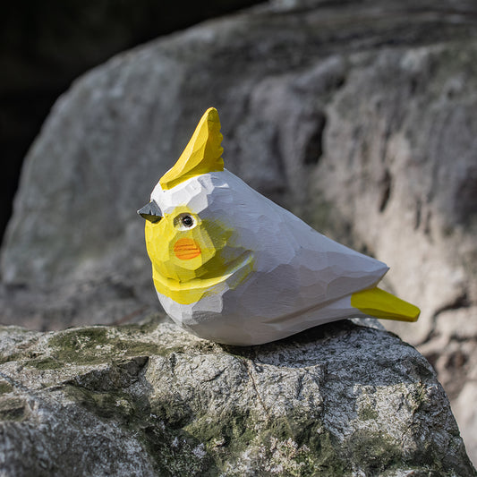 Hand-carved wooden figurine of a Lutino Cockatiel, an ornament great for home decor and gifts. Free shipping over $69.