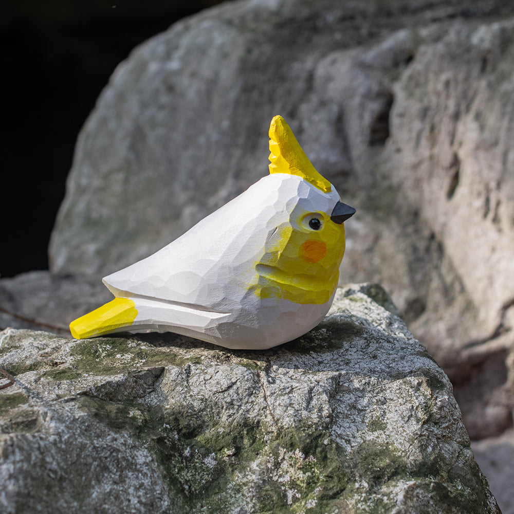 Hand-carved wooden figurine of a Lutino Cockatiel, an ornament great for home decor and gifts. 