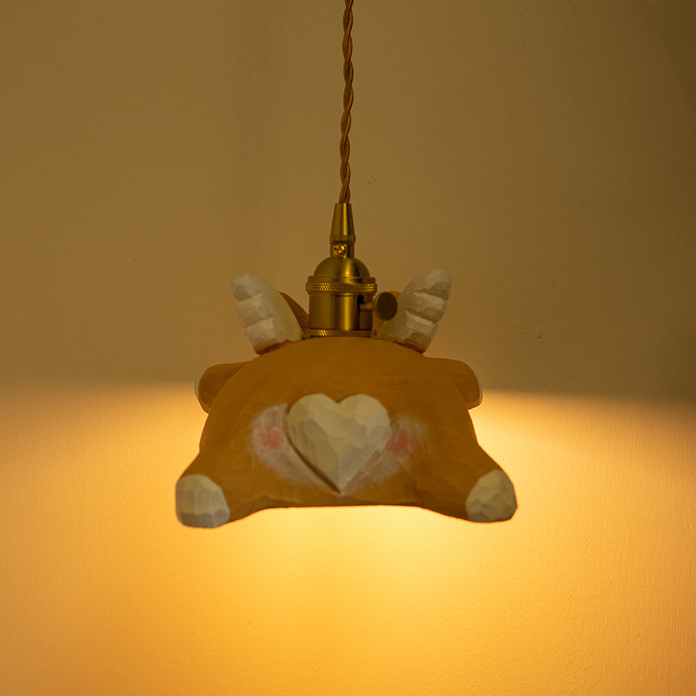 Hand-carved wooden corgi pendant light, available as a ceiling-mounted or plug-in wood pendant lamp, crafted from natural wood.