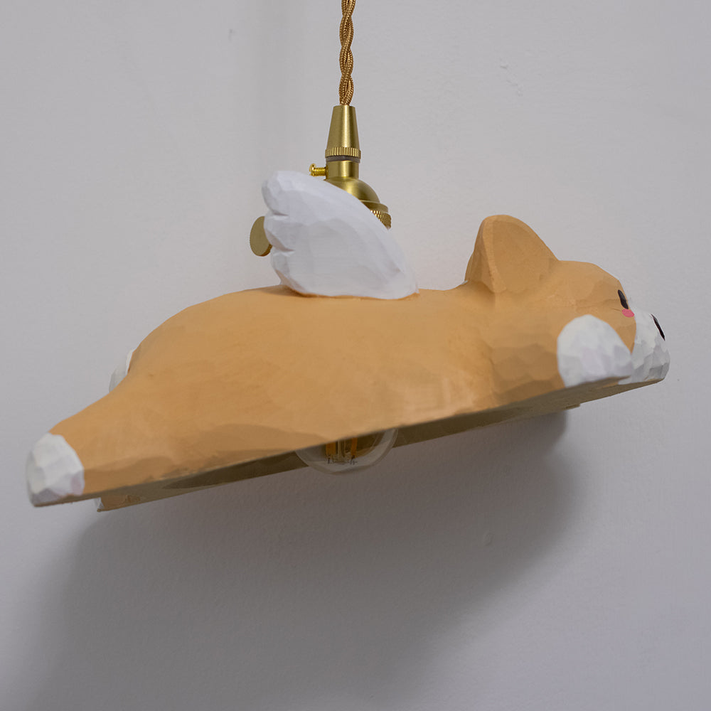 Hand-carved wooden corgi pendant light, available as a ceiling-mounted or plug-in wood pendant lamp, crafted from natural wood.
