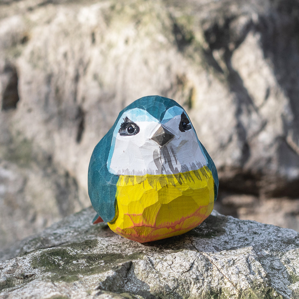 Hand-carved wooden figurine of a Eurasian Blue Tit, an ornament great for home decor and gifts. 