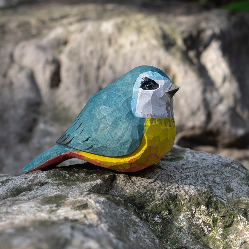 Hand-carved wooden figurine of a Eurasian Blue Tit, an ornament great for home decor and gifts. 