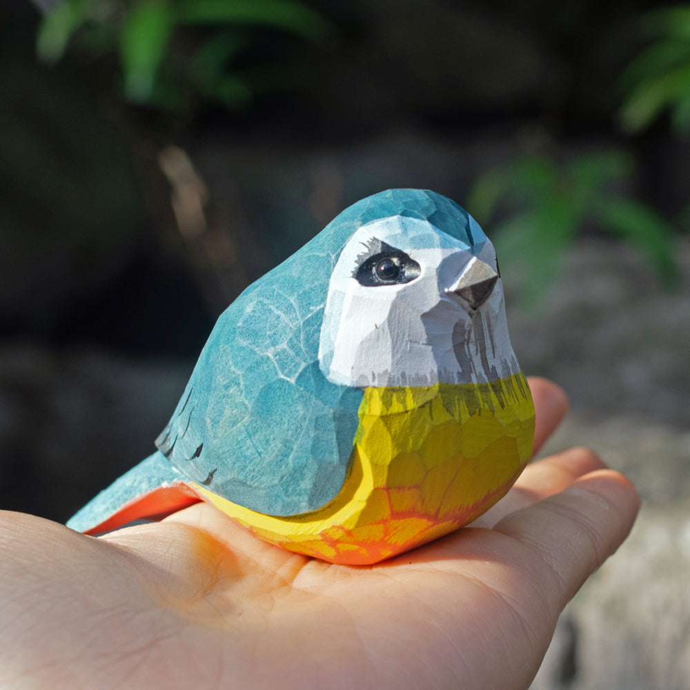 Hand-carved wooden figurine of a Eurasian Blue Tit, an ornament great for home decor and gifts. 