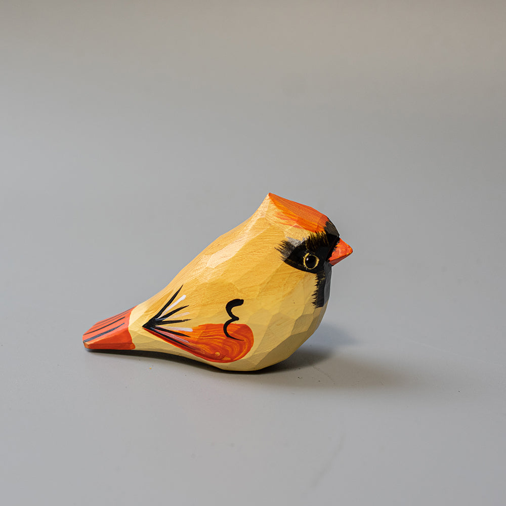 Hand-carved wooden Female Cardinal figurine in soft olive-brown with reddish accents and crest. A graceful wood bird figure. 