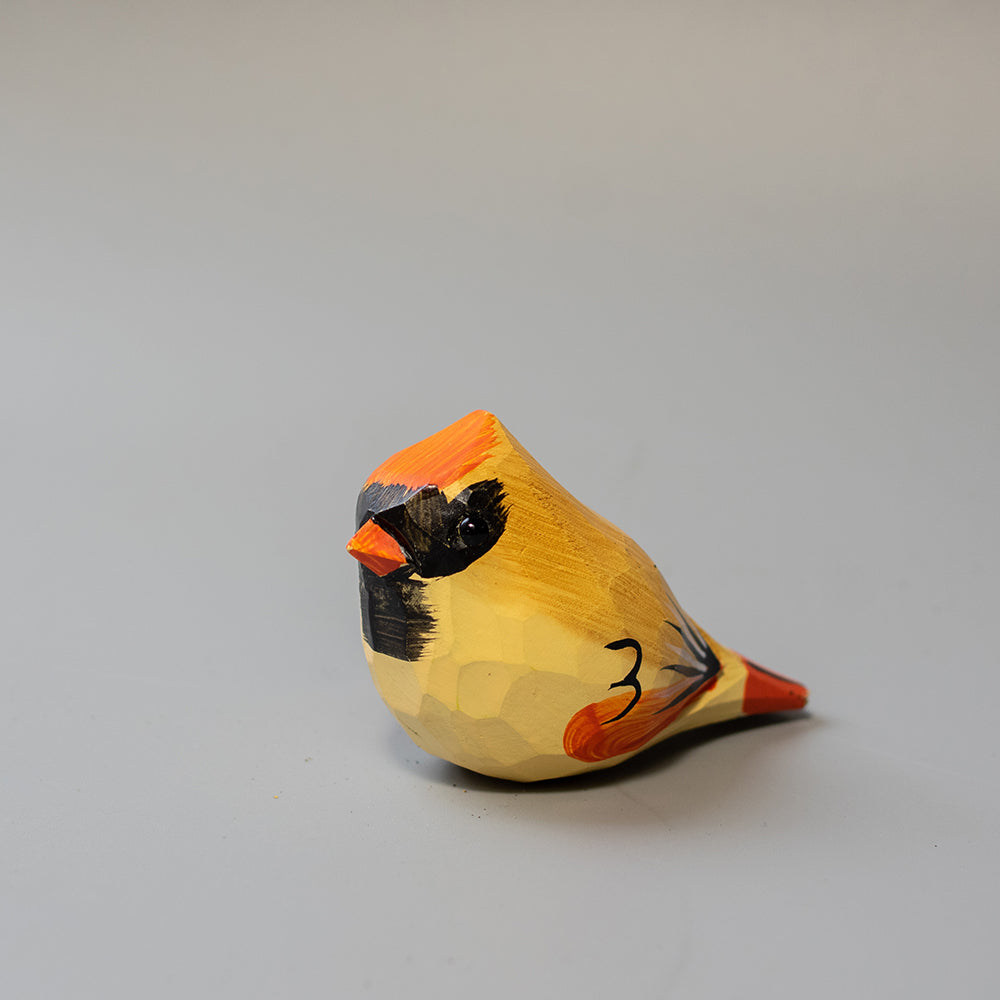 Hand-carved wooden Female Cardinal figurine in soft olive-brown with reddish accents and crest. A graceful wood bird figure. 