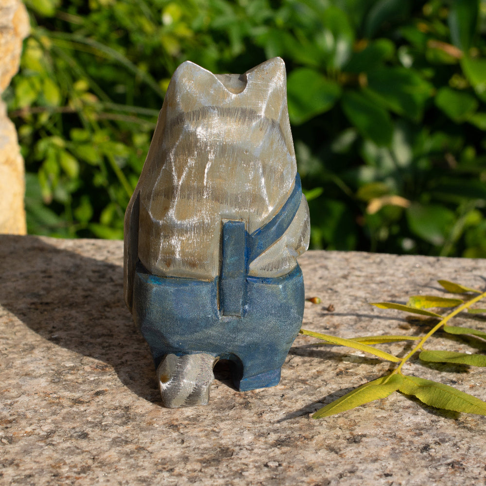 Hand-carved wooden figurine of a gray tabby cat in overalls, a rustic home decor piece for cat lovers.