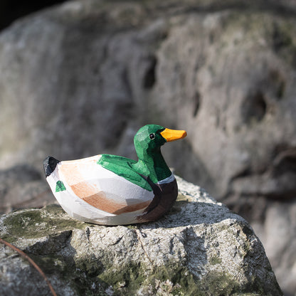 A hand-carved wooden figurines of a  mallard duck. Free shipping for orders over $69.