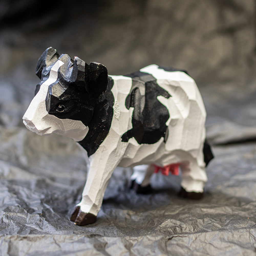 Hand-carved wooden Holstein cow figurine, an ornament great for home decor and gifts. 