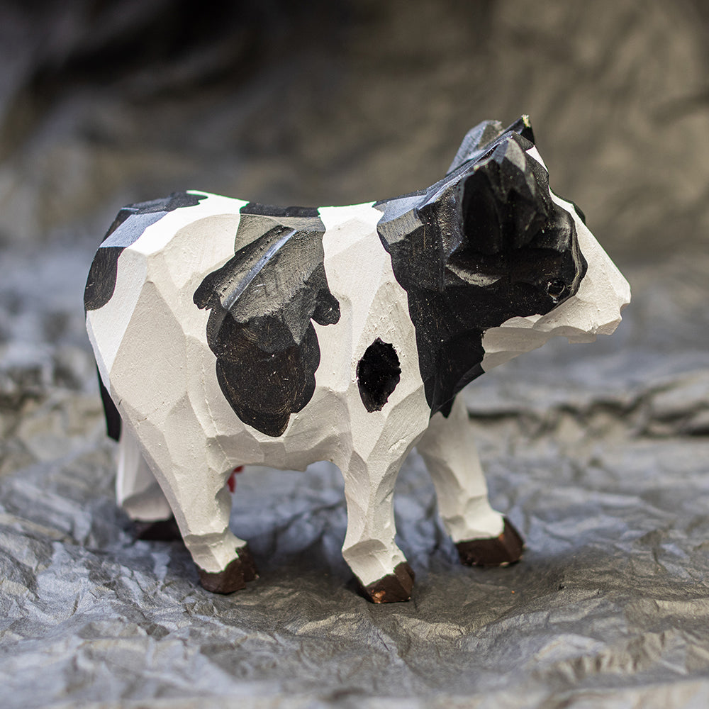 Hand-carved wooden Holstein cow figurine, an ornament great for home decor and gifts.