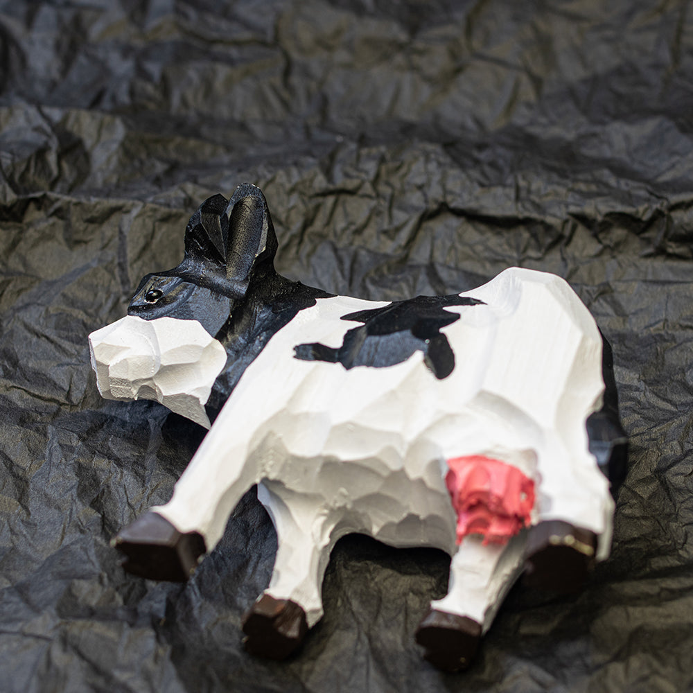 Hand-carved wooden Holstein cow figurine, an ornament great for home decor and gifts. 