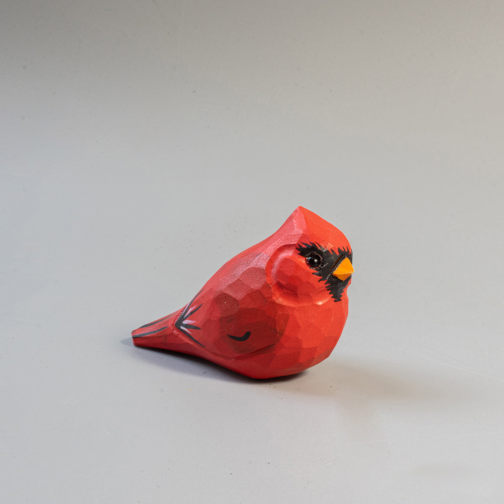 Hand-carved wooden Male Cardinal figurine in brilliant red with black mask and crest. A striking wood bird figure. 