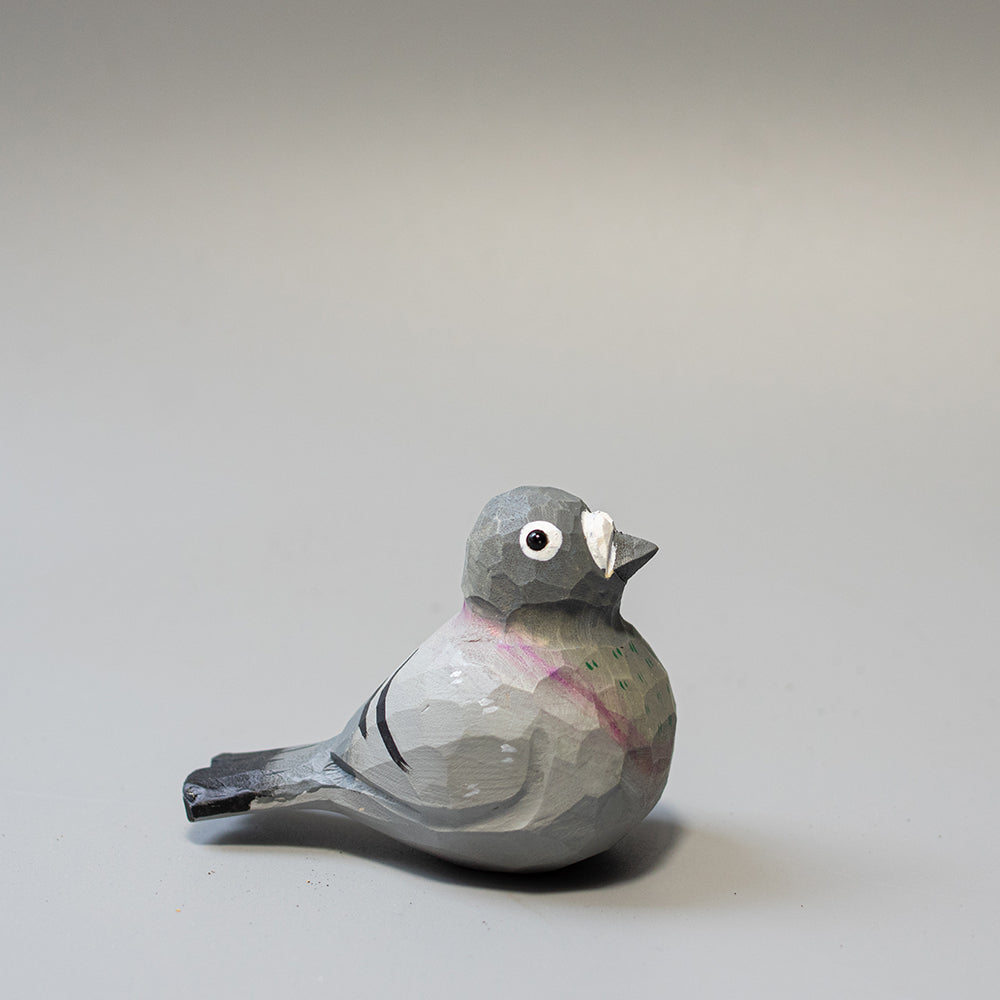 Hand-carved wooden Pigeon figurine in grey with white cere and subtle neck colors. 