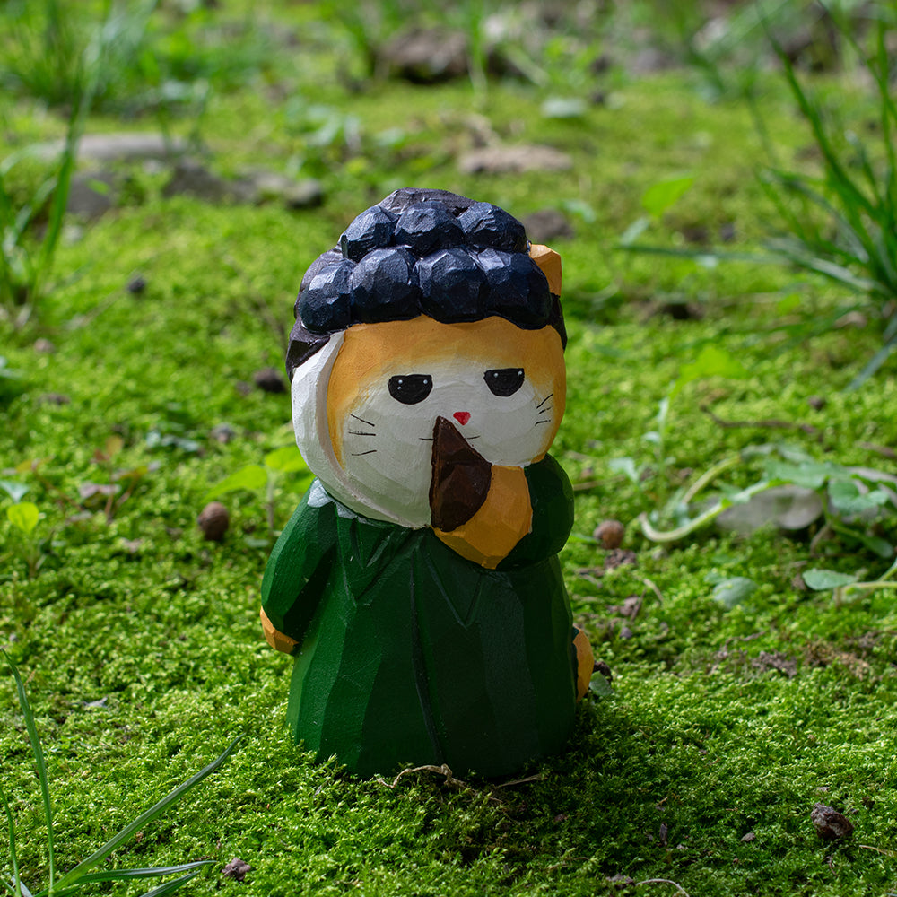 Hand-carved wood figure inspired by Van Gogh’s Self-Portrait with Bandaged Ear. A unique piece for art lovers. Explore more wood figures.