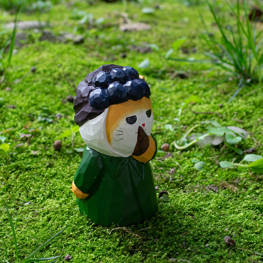 Hand-carved wood figure inspired by Van Gogh’s Self-Portrait with Bandaged Ear. A unique piece for art lovers. Explore more wood figures. 