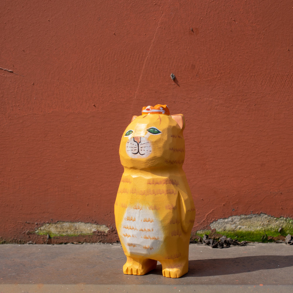 Hand carved wood figure of an orange tabby cat with a crown. Unique wood figure, traditional wood carving, wooden animal figurine, high quality wood art.