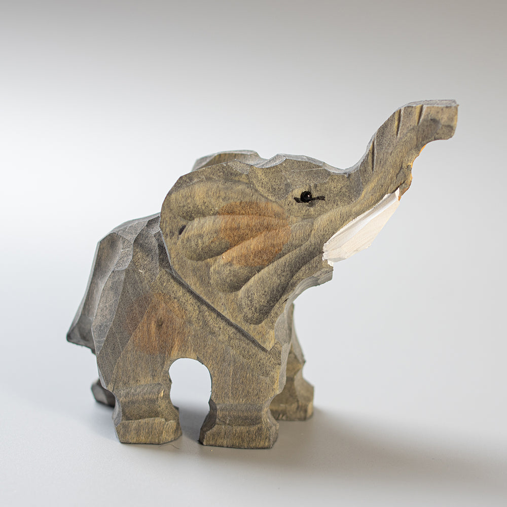 Hand-Carved wood elephant figurine,  an ornament great for home decor and gifts. Free shipping over $69.