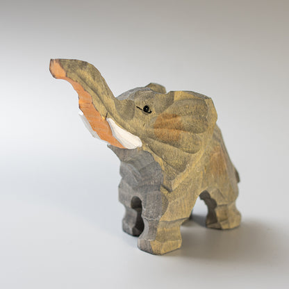 Hand-Carved wood elephant figurine,  an ornament great for home decor and gifts. Free shipping over $69.